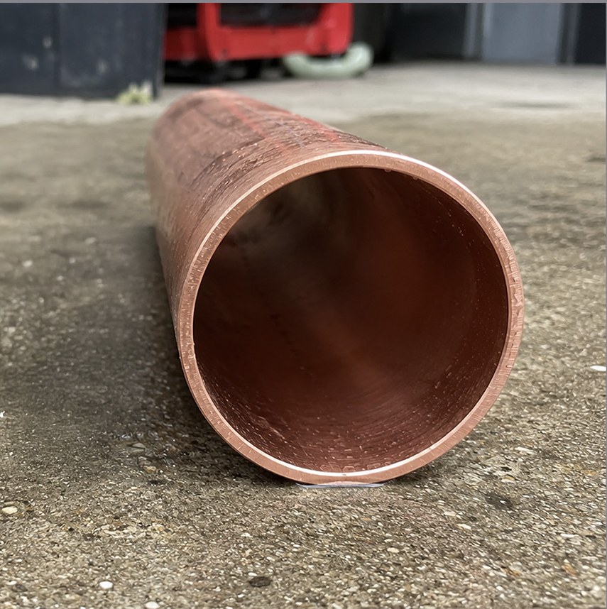 A new copper supply pipe with a clean, full-flow interior